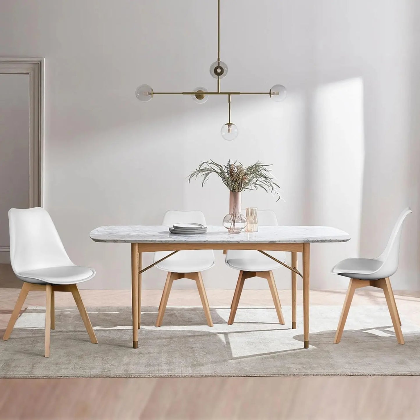 Four Modern Dining Chairs With Wood Legs For Home Use